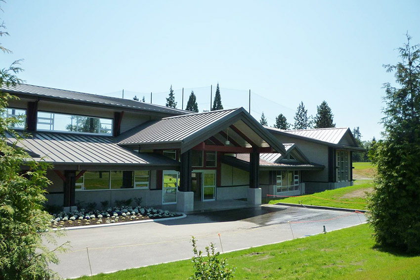 view of burnaby mountain golf centre architecture from across the driveway