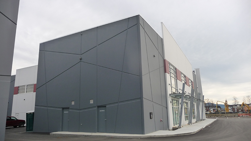 corner view showing artistic architecture features of commericial business park in port coquitlam